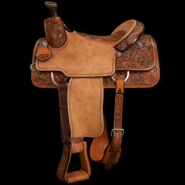 Our beautiful Half Carved Roper Saddle has beautiful leather tooling on the Skirts, Pommel and Stirrups.  Ready to rumble with a suede and roughout seat with plenty of traction. Customize this saddle today!

